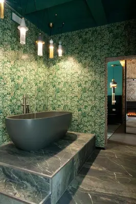 a large tub sitting on a counter in a bathroom at Colonna Collection in Rome