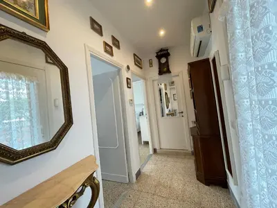 a hallway with a mirror on a wall at Mazzoni Suite, Panoramic Terrace and Comfort in Rome