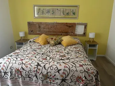 a bedroom with a bed with two pillows on it at Casa Giovi in Rome