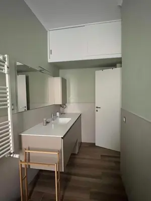 a bathroom with a sink and a toilet at Casa Giovi in Rome