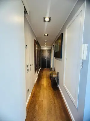 an empty hallway with chairs in a building at 22APT Luxury quiet loft with terrace in Rome