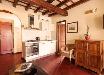 a kitchen with a sink and a stove at Principessa Trevi in Rome