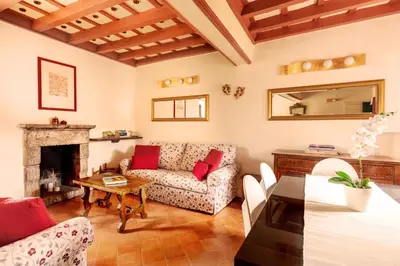 a living room with a couch and a table at Principessa Trevi in Rome