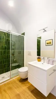 a bathroom with a toilet and a sink and a shower at Monti Nonna Francesca - ZENO 49 in Rome