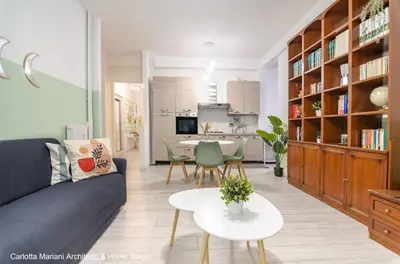 a living room with a couch and a table at Acquedotti House in Rome