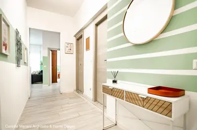 a bathroom with a sink and a mirror on the wall at Acquedotti House in Rome