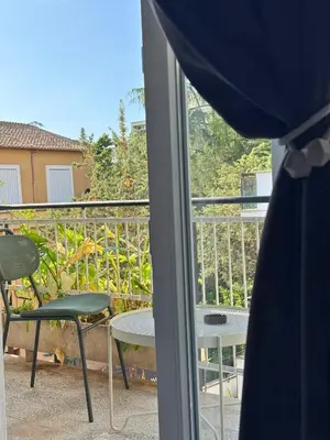 a view of a balcony with a table and a chair at Luxury Jacuzzi Suites Rome - You Rhome in Rome