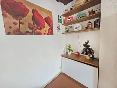 a room with a counter with a christmas tree on it at Pantheon Penthouse in Rome