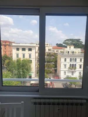 a view of a city from a window at Rienzo Apartment near Vatican in Rome