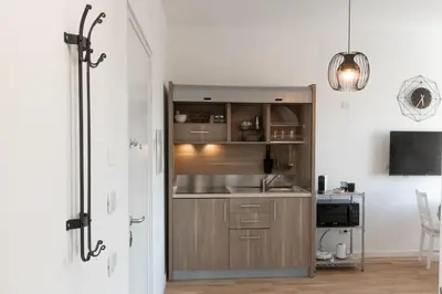 a kitchen with a sink and a counter at Rienzo Apartment near Vatican in Rome