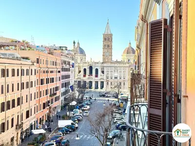 a view of a city with cars parked on a street at Santa Maria Maggiore - Vittorio Emanuele House in Rome