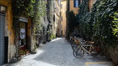 an alley with bikes parked on the side of a building at Apartment Luxury Navona in Rome