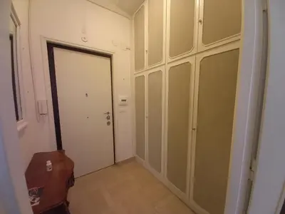 an empty room with a closet and a door at Caffarella Apartment in Rome