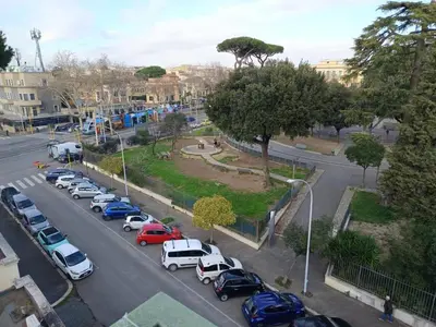 a group of cars parked in a parking lot at CASA NONNO - Casa Vacanze in Rome