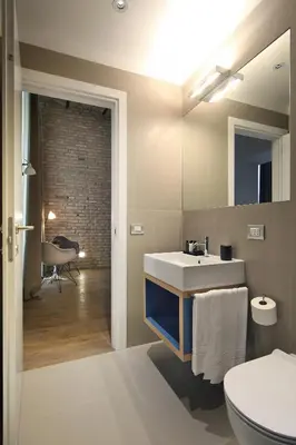 a bathroom with a sink and a toilet at Atypical Rooms in Rome