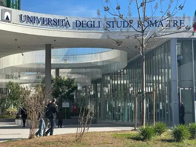 a building with a sign for the university of australia delhi studying at Ostiense - San Paolo Garbatella - Università Roma 3 in Rome