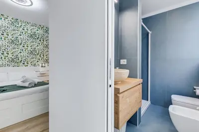 a bathroom with a toilet and a sink at New opening Ponte Milvio in Rome