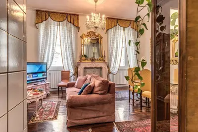 a bedroom with blue walls and a bed at dorholidayhome in Rome