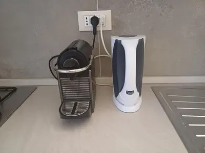 a appliance sitting on the floor next to a blender at Acquedotto di Nerone in Rome