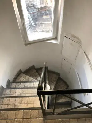 a view of a staircase with a window and a stair case at PianoDue In Trastevere in Rome