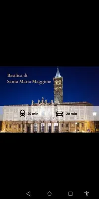 a building with a clock tower on top of it at Rome Dolce Vita Luxury Apartment 4 km da Colosseo in Rome