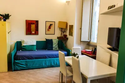 a living room with a couch and a table at Domus Vaticanae in Rome