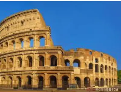 a large building with domes on the side of it at Il Colosseo Holiday home in Rome