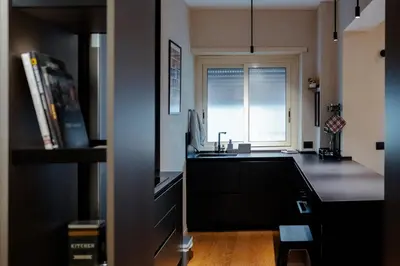 a kitchen with a sink and a window at Roma Urban Retreat in Rome