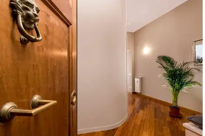 a room with a door with a plant in it at Maisondesfleurs in Rome