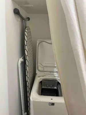 a washer and dryer in a small room at Rome City Center Apartment in Rome