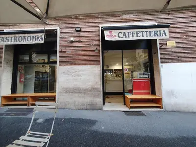a store front of a store with a sign on it at La mandragola in Rome