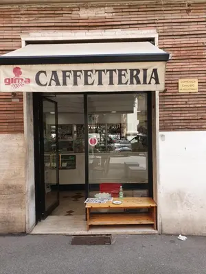 a store front of a store with a sign on it at La mandragola in Rome