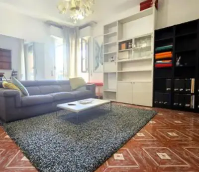 a living room with a couch and a coffee table at Biancaneve home in Rome