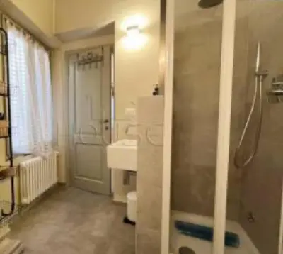a bathroom with a shower and a sink at Biancaneve home in Rome
