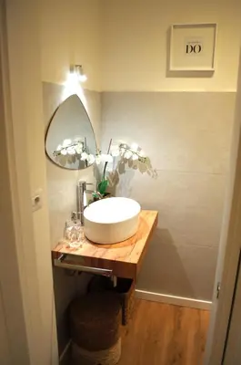 a bathroom with a sink and a mirror at Matilda House San Paolo Roma in Rome