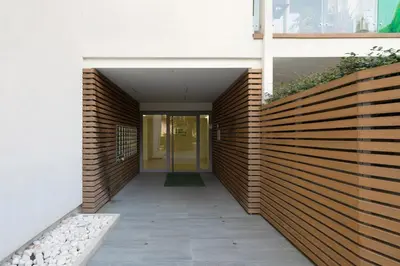 a hallway of a house with a brick wall at Green park apartment in Rome