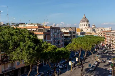 a view of a city with a street and trees at asyouRhOME - Nico - San Pietro Vaticano in Rome