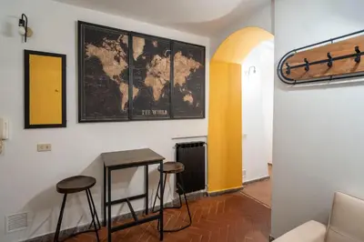 a room with a staircase and a bedroom at Home d'Elite Sistina - Trevi Fountain in Rome