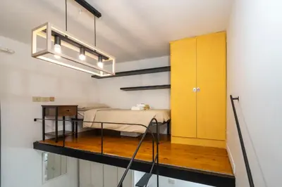an overhead view of a bedroom with a bed at Home d'Elite Sistina - Trevi Fountain in Rome