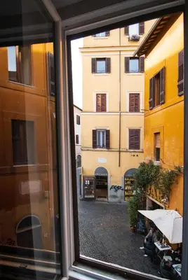 a view from a window of a building at Crezy House Trilussa in Rome
