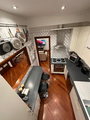 an overhead view of a kitchen with wooden floors at Casa Turchina in Rome