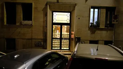 a car parked in front of a stained glass window at La Nuova Casa Di Zia - near metro A Ponte Lungo in Rome