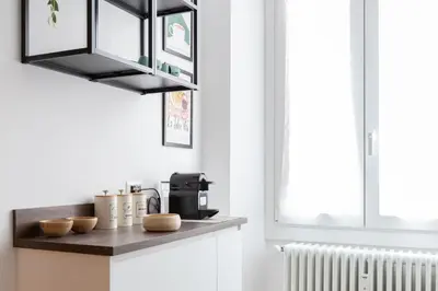 a kitchen with a counter with a coffee maker at Kimera42 Casa Vacanze in Rome