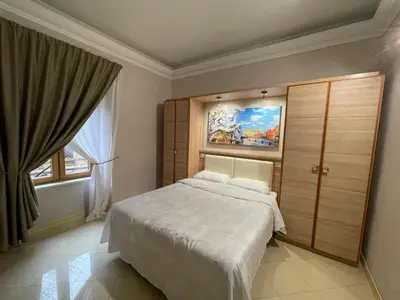 a bedroom with a bed with two towels on it at Spqr Suite Guest House in Rome