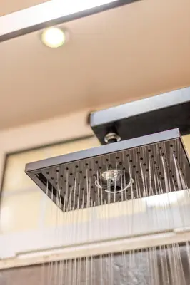 a kitchen ventilator hanging from the ceiling at Giardino Privato & Comfort - Oasi di Relax a Roma in Rome