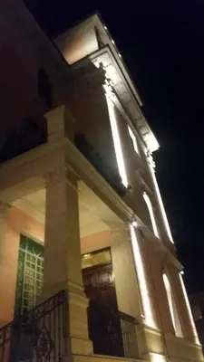 a building with lights on top of it at night at Amalia Vatican House in Rome