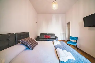 a living room with a bed and a couch at Vatican's bijoux in Rome