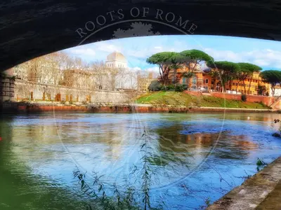 a view of a river under a bridge at Roots of Rome Apartment in Rome