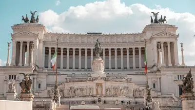 a pyramid and a column in front of a castle at Urbanhome, ready to visit Rome! in Rome