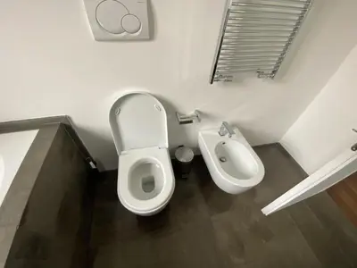 a bathroom with a toilet and a bidet at La terrazza di Baccio - Baccio's Terrace in Rome